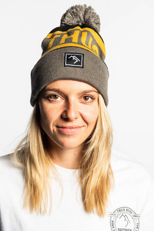 
                  
                    Load image into Gallery viewer, Bobble Hat - Black and Gold - brethrenapparel
                  
                