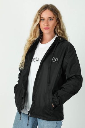 
                  
                    Load image into Gallery viewer, Black snowboard coach jacket
                  
                